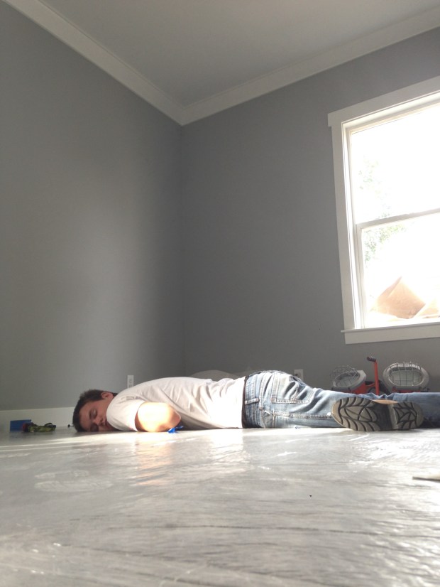 No furniture in the house means naps must be taken on the new carpet. Ok by us! Plastic is still laid that's why it's so shiny. 