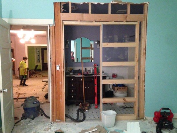 In just one day, Kevin and the guys ripped out the wall and put in the pocket door frame!