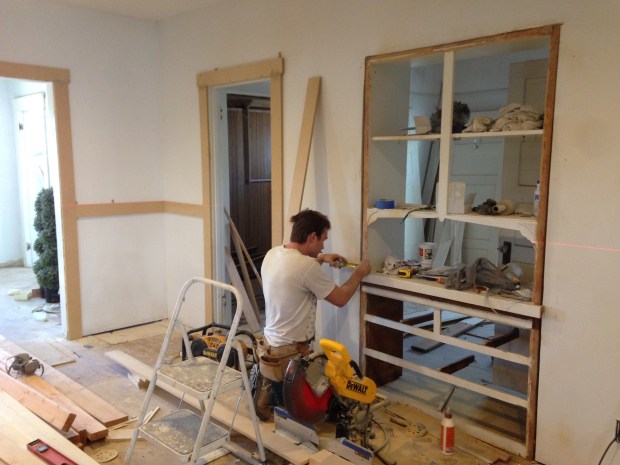 Chair moldings being installed. As you can see the back of the hutch hasn't been attached yet so you can see straight into the second bedroom. 