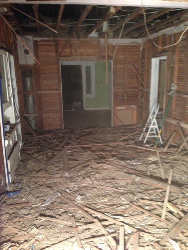 The boys removed the plaster ceiling and down came piles of insulation and debris...