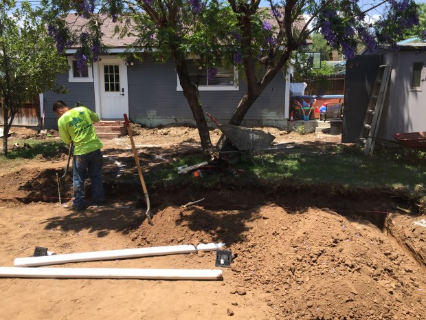 Digging the trenches for the seat wall. 