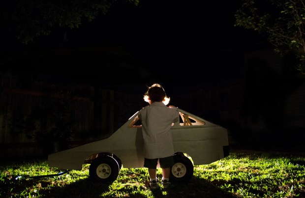 Doc checking out the flux capacitor. 