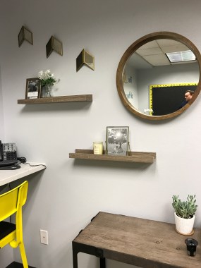 Added some random decor elements to the wall to fill in the empty space.